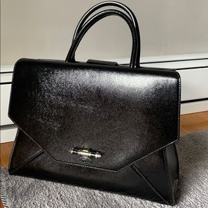 Obsedia black patent leather purse.